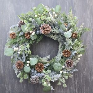 Handmade lush, artificial Winter Greenery Wreath With White And Brown Accents